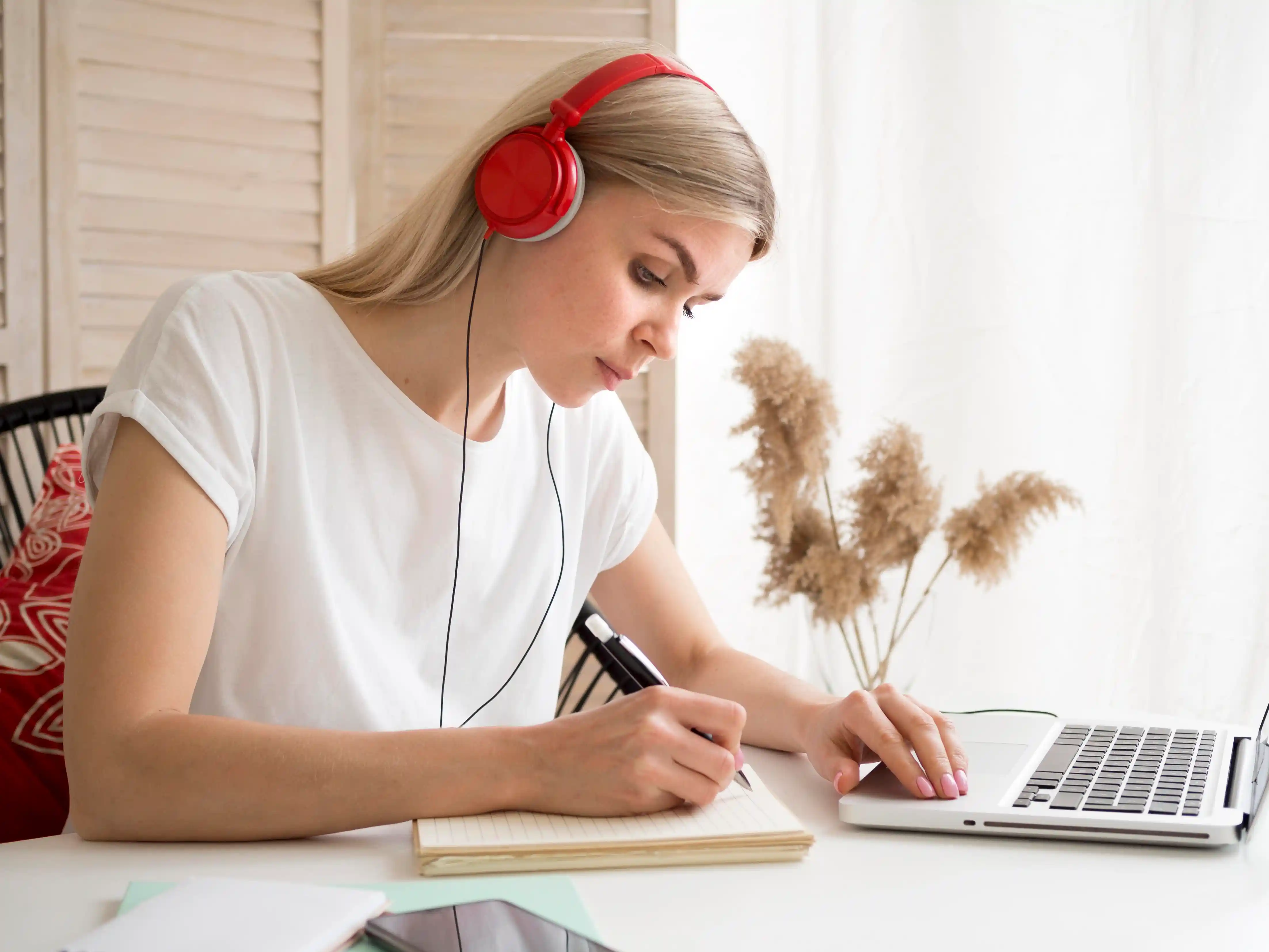 A student preparing for TEF exam with practice materials